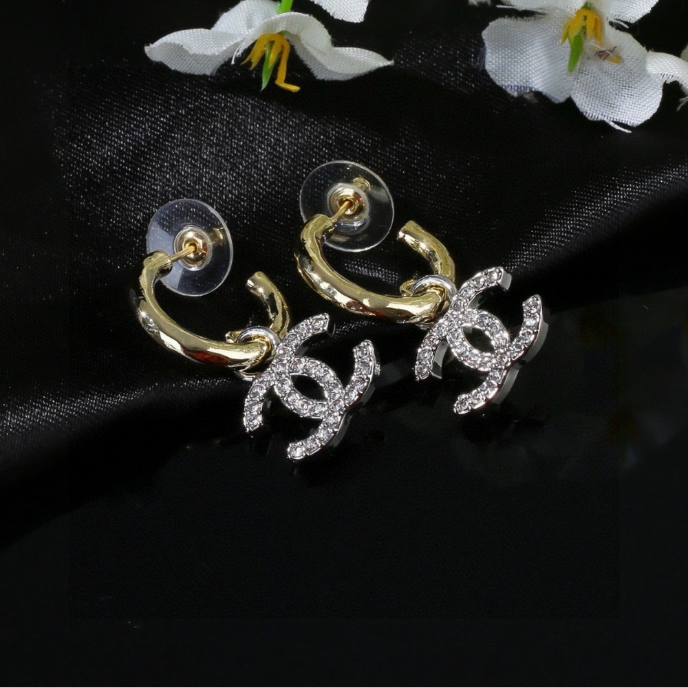 Chanel Silver Stud Earrings with Diamond Accents